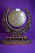 A gong having carved frame and Taj Agra to central brass.