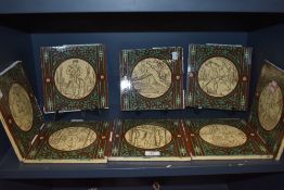Eight Minton tiles each one depicting a man carrying out a different chore or task, including