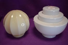 Two vintage glass lamp shades, both interesting shapes.