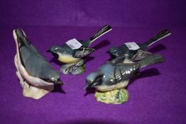 Four Beswick studies, Grey Wagtail 1041A, Grey Wagtail 1041B x2 and Nuthatch 2413,