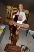 Two religious figures of Jesus on crucifix and similar plaster cast and painted version