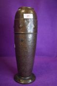 A large copper/ brass vase having Knox styling.