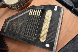 A early parlour style music instrument Zither Having German Autoharps paper label in fine