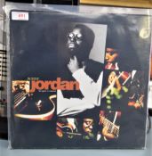 A copy of Ronny Jordan's ' the quiet revolution ' album , acid jazz / soul interest and getting hard
