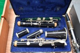 A Bundy (Selmer) resonite clarinet, impressed serial number 1459259, in toughened plastic plush