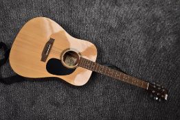 An Encore EA255 Electro Acoustic guitar, serial number 2104102957, with Ritter padded gig bag