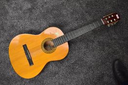 A vintage Marlin spanish style acoustic guitar
