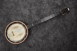 An early 20th Century 5 string Banjo, impressed mark W E TEMLETT, LONDON, Apollo Model number three,