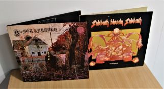 A lot of two Black Sabbath albums , the debut is a later spaceship label press and Sabbath Bloody