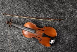 A French Violin, labelled Louis Cherpitel, having two piece 14in (36cm) back, in hard case with