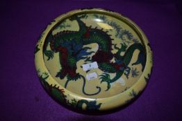 A large Bursley ware 'Dragon' bowl having yellow ground with lustre finish,with Chinese style dragon