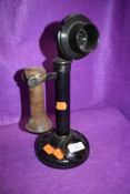 An antique telephone having number to back PL.234 No 22.