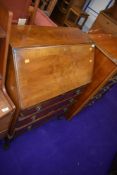 An early to mid 20th Century walnut bureau on ball and claw feet, width approx. 66cm