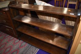 A traditional dark stained open bookshelf, width approx. 108cm