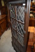 An Old Charm or Priory style dark stained corner display