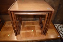 A vintage teak nest of three tables by G Plan, labelled and stamped 3406, possibly Quadrille by R