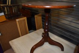 A part Victorian pedestal table having turned column and triple splay legs, top possibly replaced,