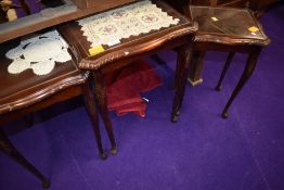 A nest of three reproduction tables
