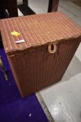 A vintage Lloyd Loom linen basket