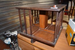 An early 20th Century mahogany table top revolving bookcase, width approx. 35cm, height 33cm