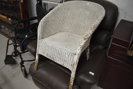 A Lloyd Loom tub chair for restoration