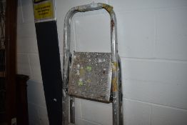 A set of aluminium step ladders