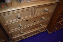 A natural pine chest of two over three drawers, width approx. 92cm