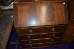 A reproduction Regency style mahogany bureau, width approx. 76cm