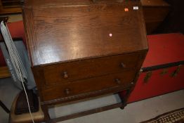 An early 20th Century oak bureau