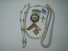 A small selection of silver and white metal jewellery including three necklaces, yellow metal