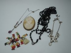 A selection of vintage jewellery including a large conche shell cameo brooch in rolled gold mount,