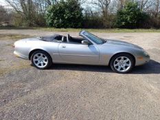 A classic Jaguar Car. A silver Jaguar XK8 4litre V8 convertible,T861CBD registered on 07-04-1999,c