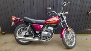 A rare Harley Davidson SS 125cc motorbike registration OUG160P, registered 10/5/1976, with a 125cc
