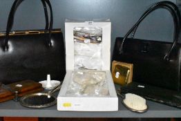 A selection of ladies dress items including handbags and cigarette case