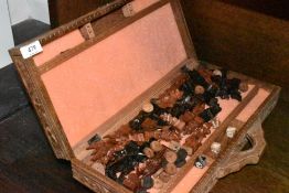 An Indonesian or similar style hand carved chess and games set complete