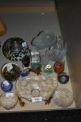 A collection of glass paperweights, swan tea light holder and novelty glass dogs.