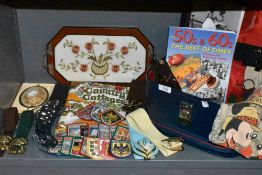 A selection of sew on travel patches and similar including embroidery tray