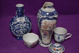 A selection of Chinese export porcelain including tea bowl and chocolate cup both in fine