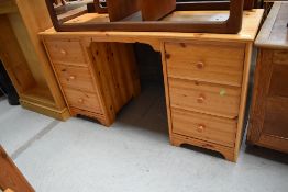 A vintage pine dressing table or desk