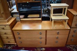 A vintage teak and laminate dressing table having offset configuration