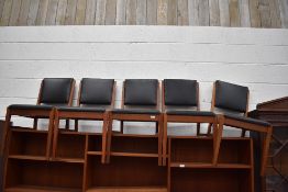 A set of five stained frame dining or office chairs having vinyl seats and backs, Gordon Russell