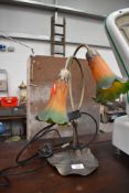 A reproduction Art Nouveau style table lamp