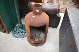A fire pit made from old gas cannister