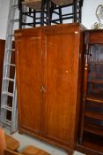An early 20th Century mahogany wardrobe having semi fitted interior, approx. 108cm width including