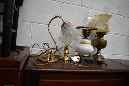 A selection of lamps, electric and oil type