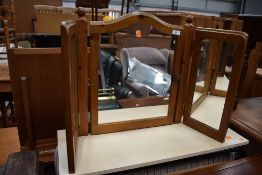 A modern pine triptych dressing table mirror