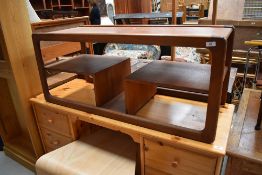 A vintage G plan or Danish teak coffee table , interesting design with undershelves and magazine