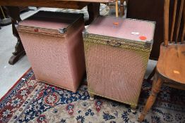 Two vintage woven fibre laundry baskets