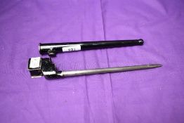 A British 1942 MK2 No4 Rifle Bayonet, with metal scabbard