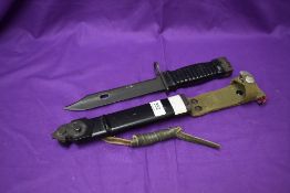 A German 1963 Stoner Assault Rifle Bayonet, blade marked Carl Eickhorn & Co Solingen, metal